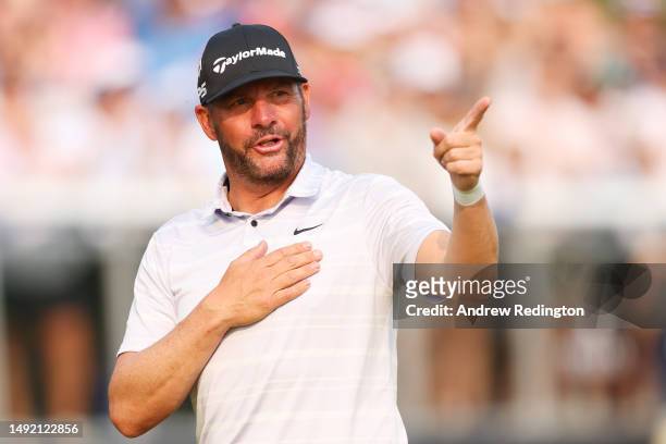 Michael Block of the United States, PGA of America Club Professional, acknowledges the crowd after playing the 18th green during the final round of...