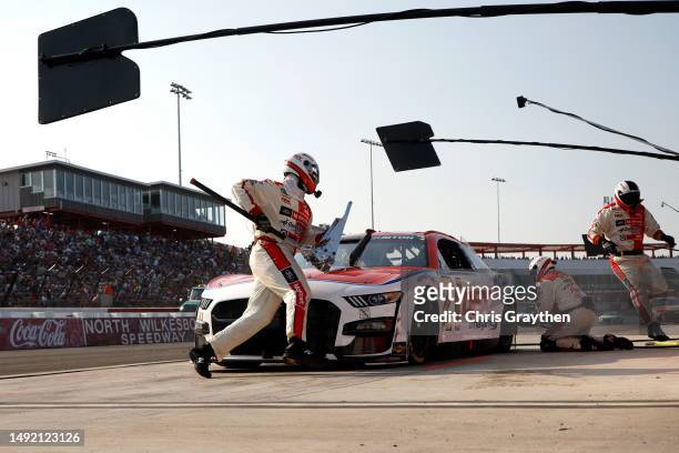 Harrison Burton, driver of the Motorcraft/DEX Imaging Ford, pits during the NASCAR Cup Series All-Star Open Race at North Wilkesboro Speedway on May...