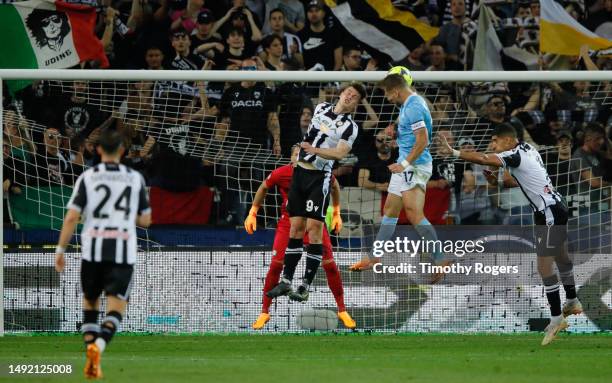 Ciro Immobile of Lazio has a header at goal during the Serie A match between Udinese Calcio and SS Lazio at Dacia Arena on May 21, 2023 in Udine,...