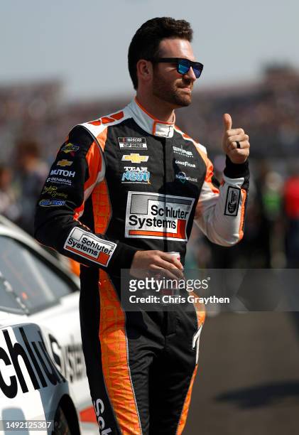 Corey LaJoie, driver of the Schluter Systems Chevrolet, waits on the grid prior to the NASCAR Cup Series All-Star Open Race at North Wilkesboro...
