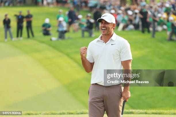 Brooks Koepka of the United States celebrates winning on the 18th green during the final round of the 2023 PGA Championship at Oak Hill Country Club...