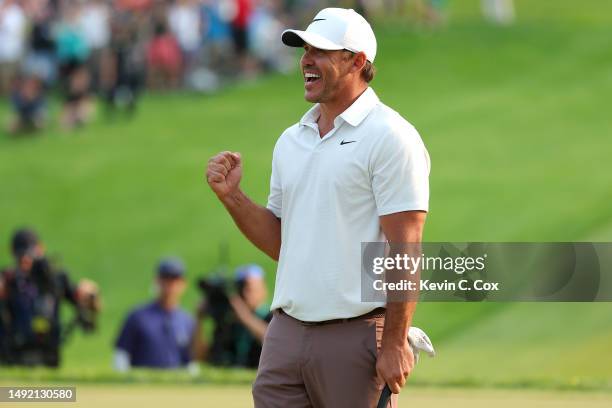 Brooks Koepka of the United States celebrates winning on the 18th green during the final round of the 2023 PGA Championship at Oak Hill Country Club...