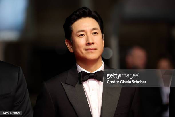 Lee Sun-Kyun attends the "Project Silence" red carpet during the 76th annual Cannes film festival at Palais des Festivals on May 21, 2023 in Cannes,...