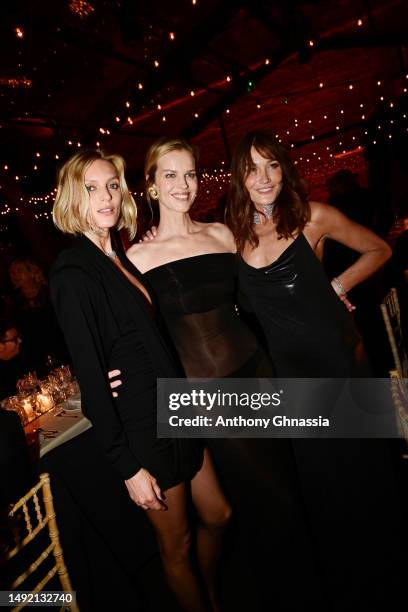 Anja Rubik, Eva Herzigová and Carla Bruni attend the Kering Women In Motion Awards during the Kering and Cannes Film Festival Official Dinner on May...