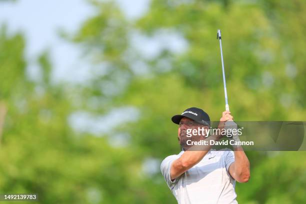 Michael Block of The United States plays his tee shot on the 15th hole where he made a hole-in-one during the final round of the 2023 PGA...