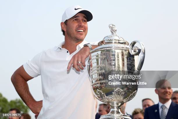 Brooks Koepka of the United States celebrates with the Wanamaker Trophy after winning the 2023 PGA Championship at Oak Hill Country Club on May 21,...