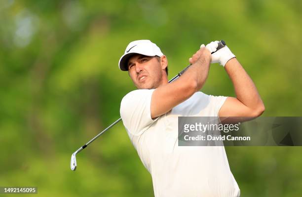 Brooks Koepka of The United States plays his tee shot on the 15th hole during the final round of the 2023 PGA Championship at Oak Hill Country Club...
