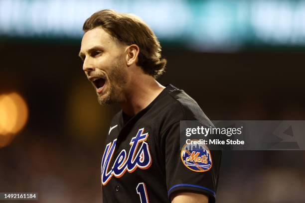 Jeff McNeil of the New York Mets reacts after hitting an RBI sacrifice fly to left field in the eighth inning against the Cleveland Guardians at Citi...