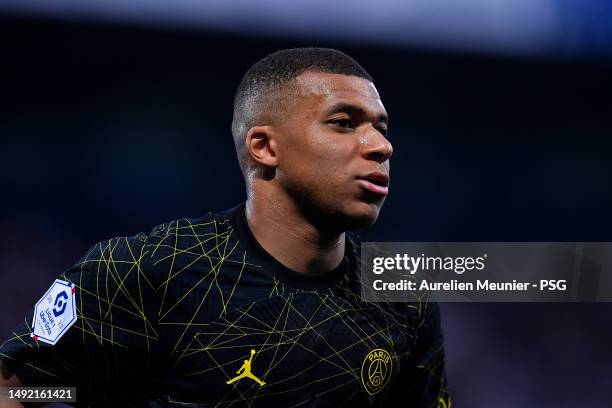 Kylian Mbappe of Paris Saint-Germain looks on during the Ligue 1 match between AJ Auxerre and Paris Saint-Germain at Stade Abbe Deschamps on May 21,...