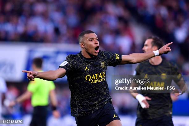 Kylian Mbappe of Paris Saint-Germain reacts after scoring during the Ligue 1 match between AJ Auxerre and Paris Saint-Germain at Stade Abbe Deschamps...