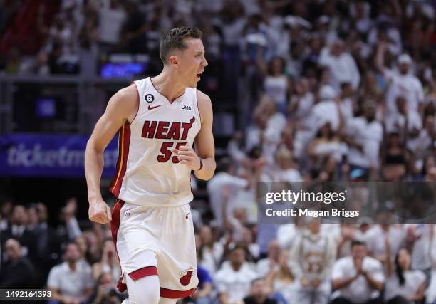 Duncan Robinson of the Miami Heat reacts after a three point basket during the second quarter against the Boston Celtics in game three of the Eastern...