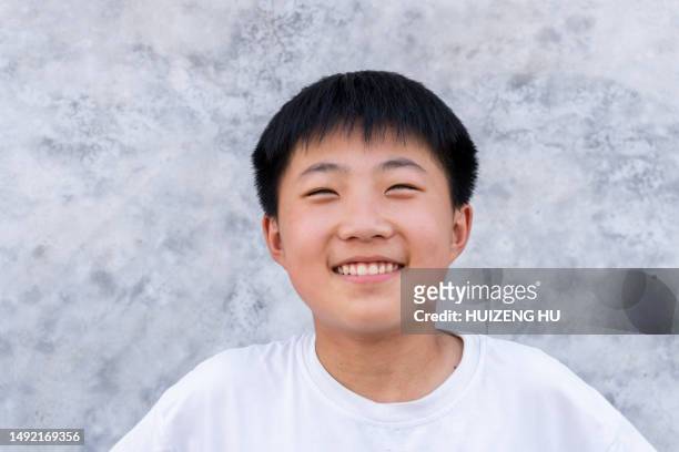portrait of a happy teenager boy - 13 year old cute boys stock pictures, royalty-free photos & images
