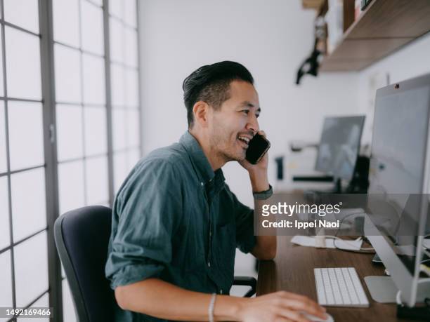man working in home office - white collar worker stock pictures, royalty-free photos & images