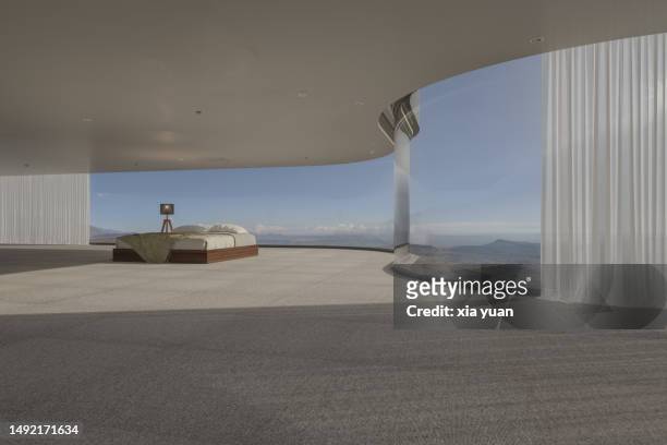 minimalist modern bedroom and glass wall - penthouse stock-fotos und bilder