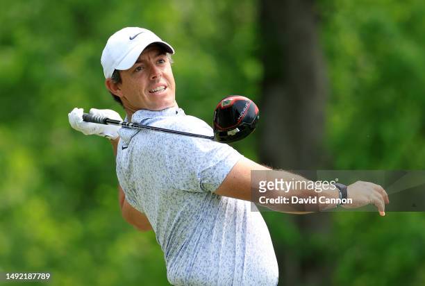 Rory McIlroy of Northern Ireland lets go of his driver as he plays his tee shot on the fourth hole during the final round of the 2023 PGA...