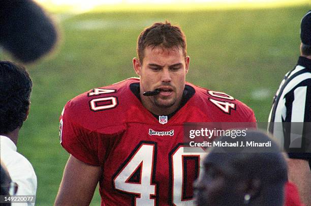 Fullback Mike Alstott of the Tampa Bay Buccaneers goes to the sideline during a time-out in a NFL game against the Green Bay Packers at Tampa Stadium...