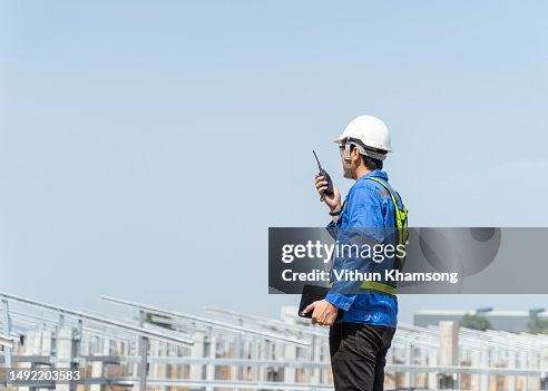 Asian engineer checking progress and structure at construction site. Asian engineer checking progress and structure at construction site.