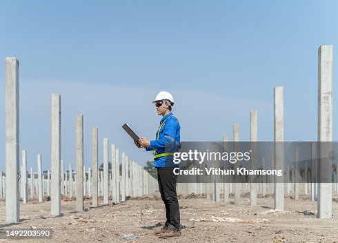 Males engineer checking progress and structure at construction site. Males engineer checking progress and structure at construction site.