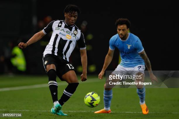 Destiny Udogie of Udinese and Felipe Anderson of Lazio during the Serie A match between Udinese Calcio and SS Lazio at Dacia Arena on May 21, 2023 in...