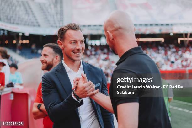 Head coach Matthias Jaissle of FC Red Bull Salzburg and head coach Christian Ilzer of SK Puntigamer Sturm Graz prior to the Admiral Bundesliga match...