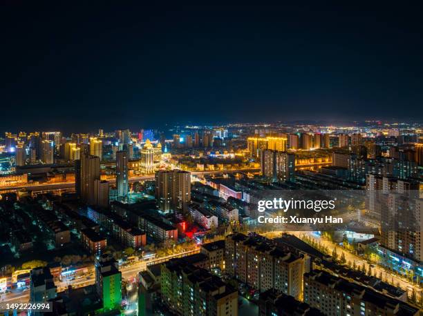 night view of modern city - provinz hebei stock-fotos und bilder