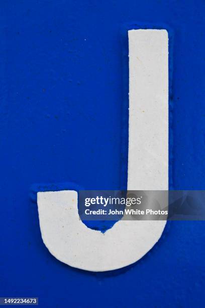 the letter j painted on a boat. - letter j stock pictures, royalty-free photos & images