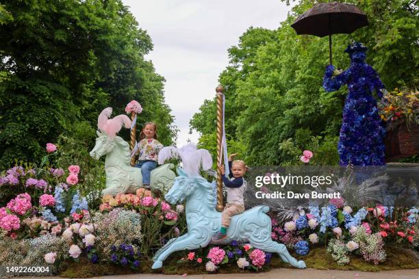 Stella Mackinnon, four and her sister Persephone Mackinnon, two at Chelsea in Bloom which launches today with the Theme "Flowers On Film" in line...