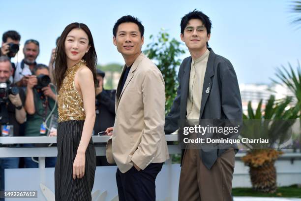 Dongyu Zhou, Director Anthony Chen and Haoran Liu attend the "Ran Dong " photocall at the 76th annual Cannes film festival at Palais des Festivals on...