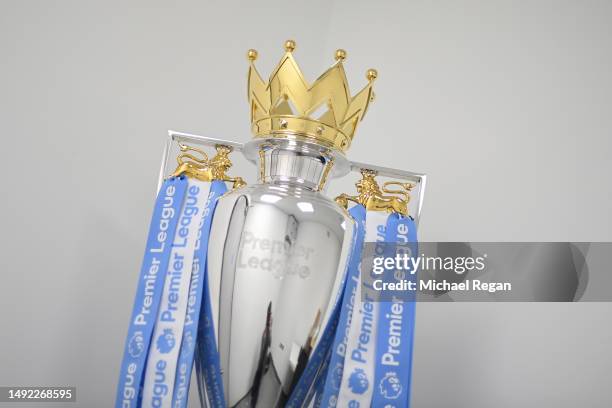 General view of the Premier League trophy with Manchester City coloured blue and white ribbons during the Premier League match between Manchester...