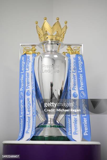 General view of the Premier League trophy with Manchester City coloured blue and white ribbons during the Premier League match between Manchester...