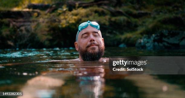 cold water therapy hobby - realism stock pictures, royalty-free photos & images
