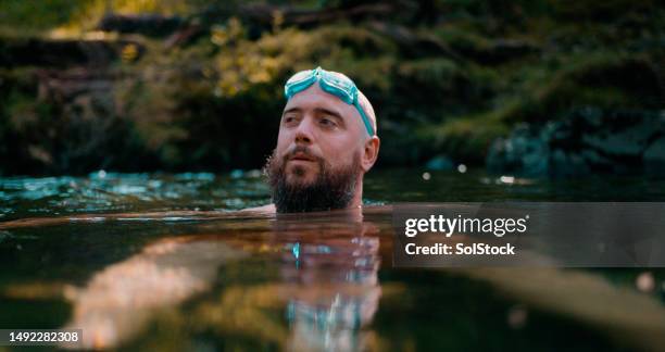 swimming is escapism - older men exercising stock pictures, royalty-free photos & images
