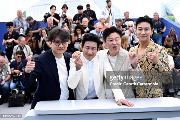 Director Kim Tae-gon, Lee Sun-kyun, Kim Hee-won and Ju Ji-hun attend the "Project Silence" photocall at the 76th annual Cannes film festival at...