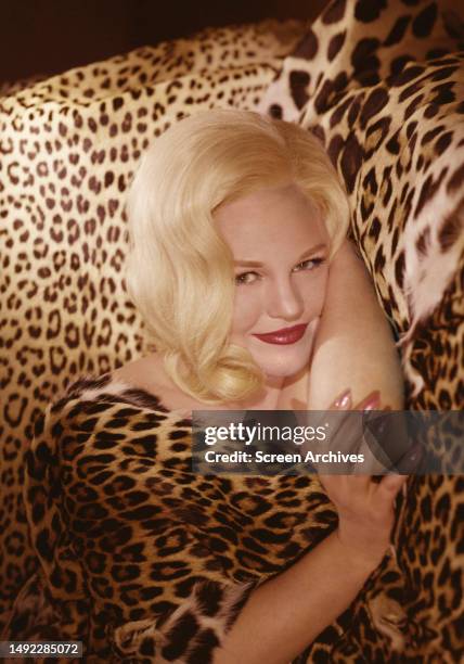 Peggy Lee color pose in leopard skin top of the popular singer, circa late 1950's.