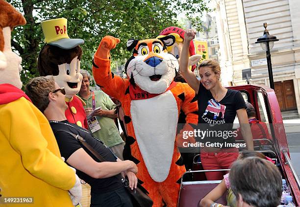 Team Kellogg's athlete Summer Sanders Tony the Tiger and Snap, Crackle and Pop enjoy a breakfast tour of London as part of Kellogg's From Great...