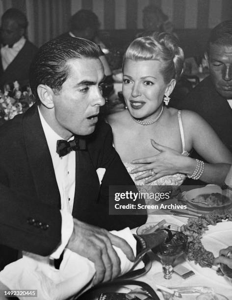 Lana Turner and Tyrone Power at Ciro's Hollywood circa, 1947 with Bruce Cabot visible at side.