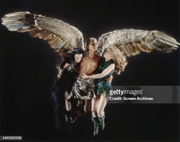 'Barbarella' Jane Fonda and Anita Pallenberg being carried by winged bare chested John Phillip Law, 1968.