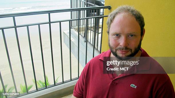 Tyler Forrester, a 28-year-old native of Dillon, Montana, sits on the balcony of his rented condo in Jaco Beach, Costa Rica, June 28, 2012. Forrester...