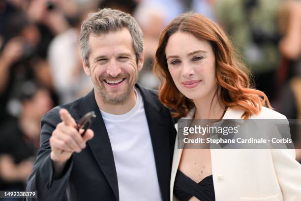 Guillaume Canet and Laetitia Dosch attend the "Acid" photocall at the 76th annual Cannes film festival at Palais des Festivals on May 22, 2023 in...