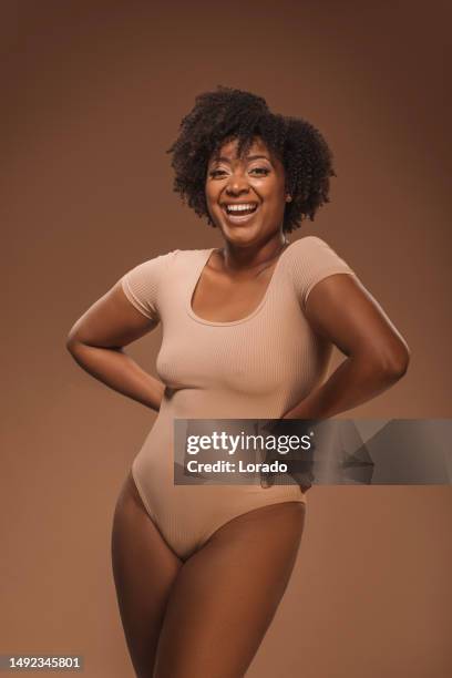 beautiful adult diverse black female woman posing for studio body positive shot - voluptuous body stock pictures, royalty-free photos & images