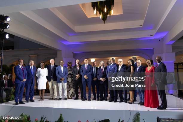 Prime Minister Andrew Holness Opposition Leader Mark Golding and Adam Stewart , executive chairman, Sandals Resorts International, during the Sandals...