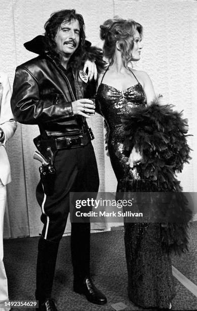 Singer/Songwriter/Actor Alice Cooper with Actress Valerie Perrine backstage during the Rock Awards at the Santa Monica Civic Auditorium in Santa...