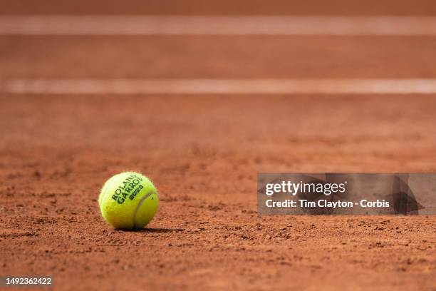 Roland Garros tennis ball on the clay surface of Court Philippe Chatrier during the 2023 French Open Tennis Tournament at Roland Garros on May 22 in...