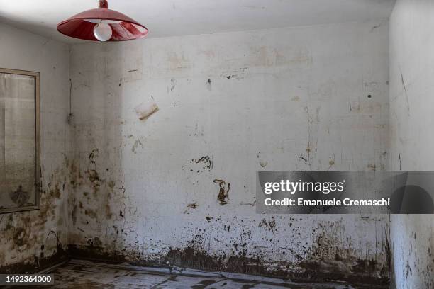 General view of an empty living room of a flooded apartment on May 22, 2023 in Forlì, Italy. Fifteen people have died and forty thousands have been...