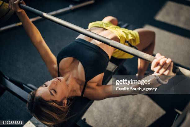 bench press training - barbell stock pictures, royalty-free photos & images