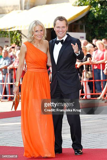 Judy Witten and Daniel Bahr arrive for the Bayreuth festival 2012 premiere on July 25, 2012 in Bayreuth, Germany.