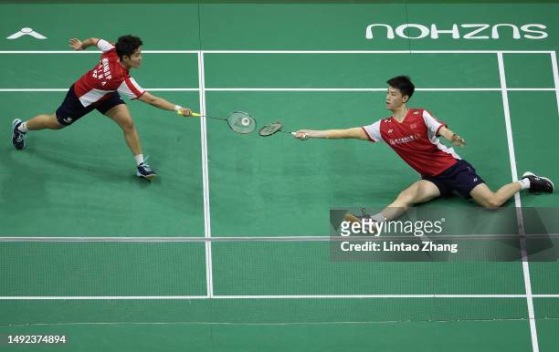 Feng Yanzhe and Huang Dongping of China compete in the Mixed Doubles Semifinal match against Kyohei Yamashita and Naru Shinoya of Japan during day...