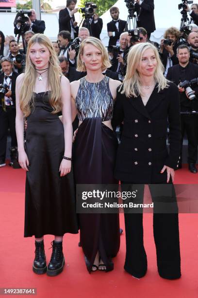 Florence Baker, Mia Wasikowska and director Jessica Hausner attend the "Club Zero" red carpet during the 76th annual Cannes film festival at Palais...