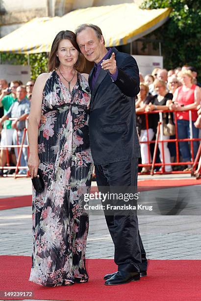 Edgar Selge and his wife Franziska Walser arrive for the Bayreuth festival 2012 premiere on July 25, 2012 in Bayreuth, Germany.