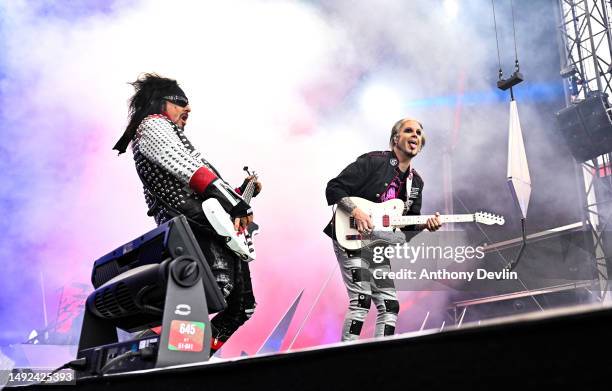 Nikki Sixx and John 5 of Mötley Crüe perform live for the "The World Tour" at Sheffield Bramall Lane on May 22, 2023 in Sheffield, England.